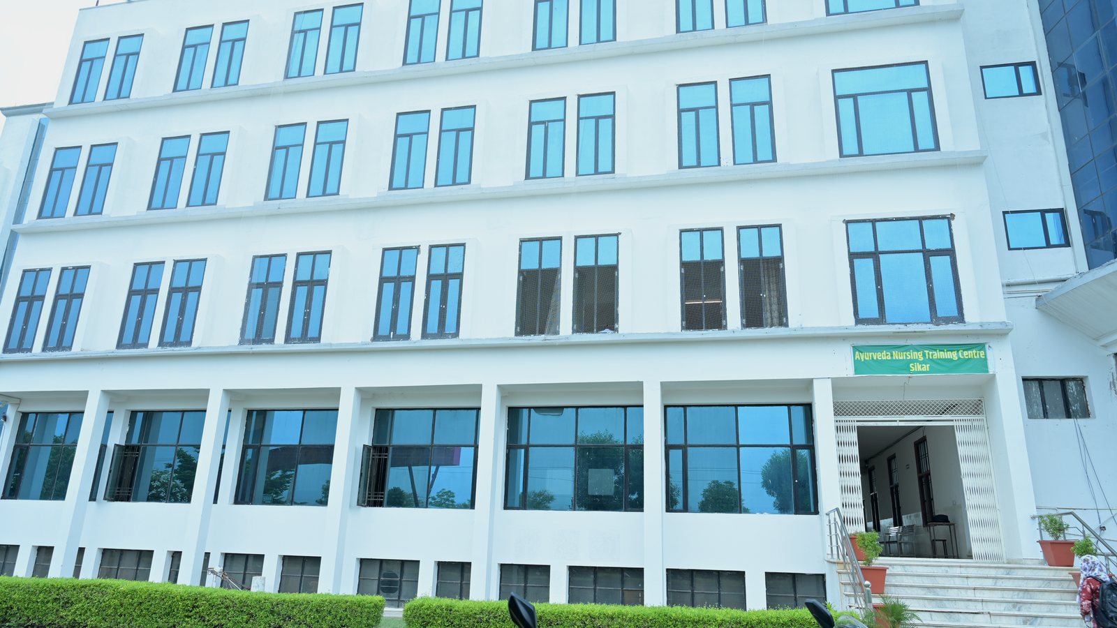 AYUSH DANP training centre building at MGGC Sikar photographed in July 2026